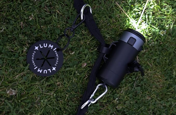 Lumi Dog Waste Bag Holder with LED Flashlight, Hands-Free Dog Walking Accessory with Carabiner Clip & Bags - Perfect for Camping and Lighting Your Path (BLACK)