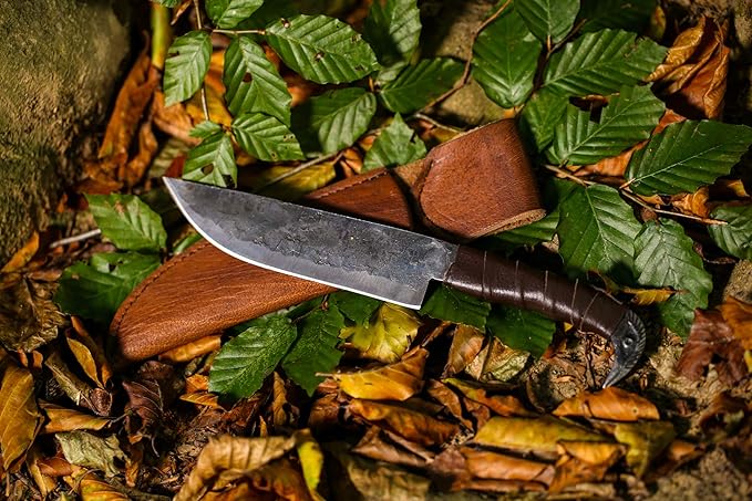 Odin's Raven Norse Viking-styled Knife 10.3" - Hand Forged 6.5" Carbon Steel Blade, Raven's Head Hilt and Leather Sheath - Unique Medieval Seax Style - Norse Knife for Hunting & Camping