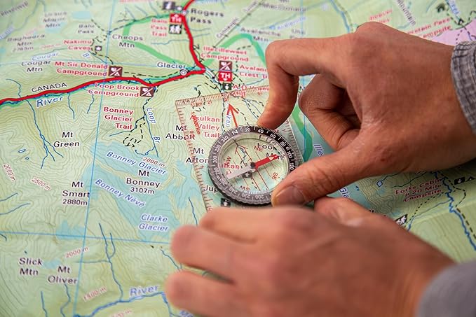 Coghlan’s Outdoor Compasses – Lightweight, Durable Navigation Tools for Hiking, Camping, Orienteering & Survival with Map, Wrist, Lensatic, LED, and Carabiner Options