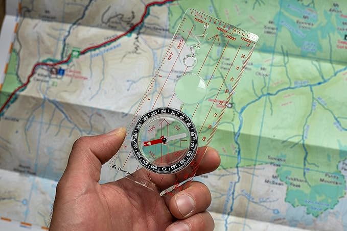 Coghlan’s Outdoor Compasses – Lightweight, Durable Navigation Tools for Hiking, Camping, Orienteering & Survival with Map, Wrist, Lensatic, LED, and Carabiner Options