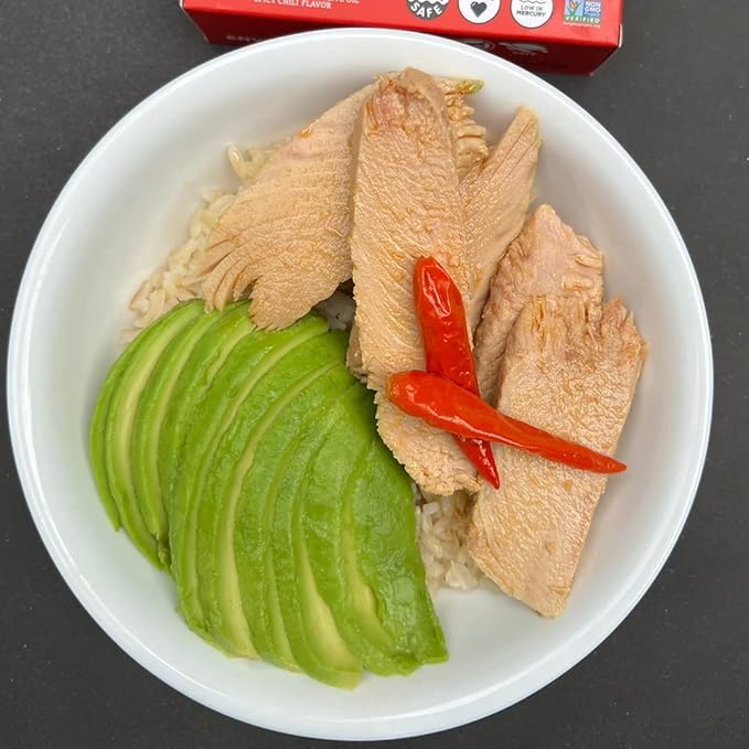 Natural Catch Tuna Spicy Yellowfin Filets, Hand Cut, Pole & Line Caught, 130 Calories Gluten-Free, Paleo, Keto Friendly, Premium Yellowfin Tuna in Extra Virgin Olive Oil and Spicy Chili's (4.4 oz per can- Pack of 12) (Yellowfin Spicy Tuna)
