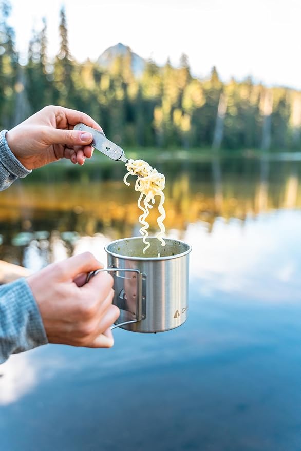 Coghlan's Stainless Steel Camp Mug/Pot – 600 mL (21 oz.) Lightweight Outdoor Cooking Pot & Cup with Folding Handles & Measurement Markings – Durable Backpacking, Hiking & Camping Cookware